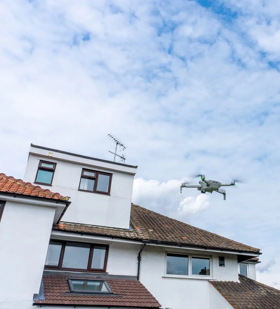 drone above the roof druing inspection
